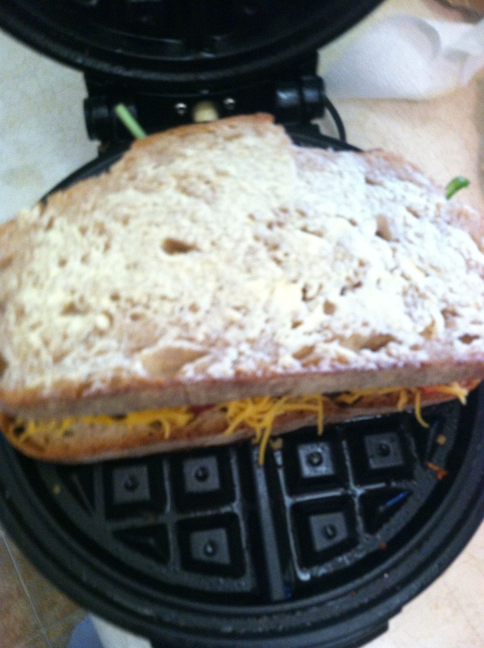 Put that other slice of buttered bread on top!