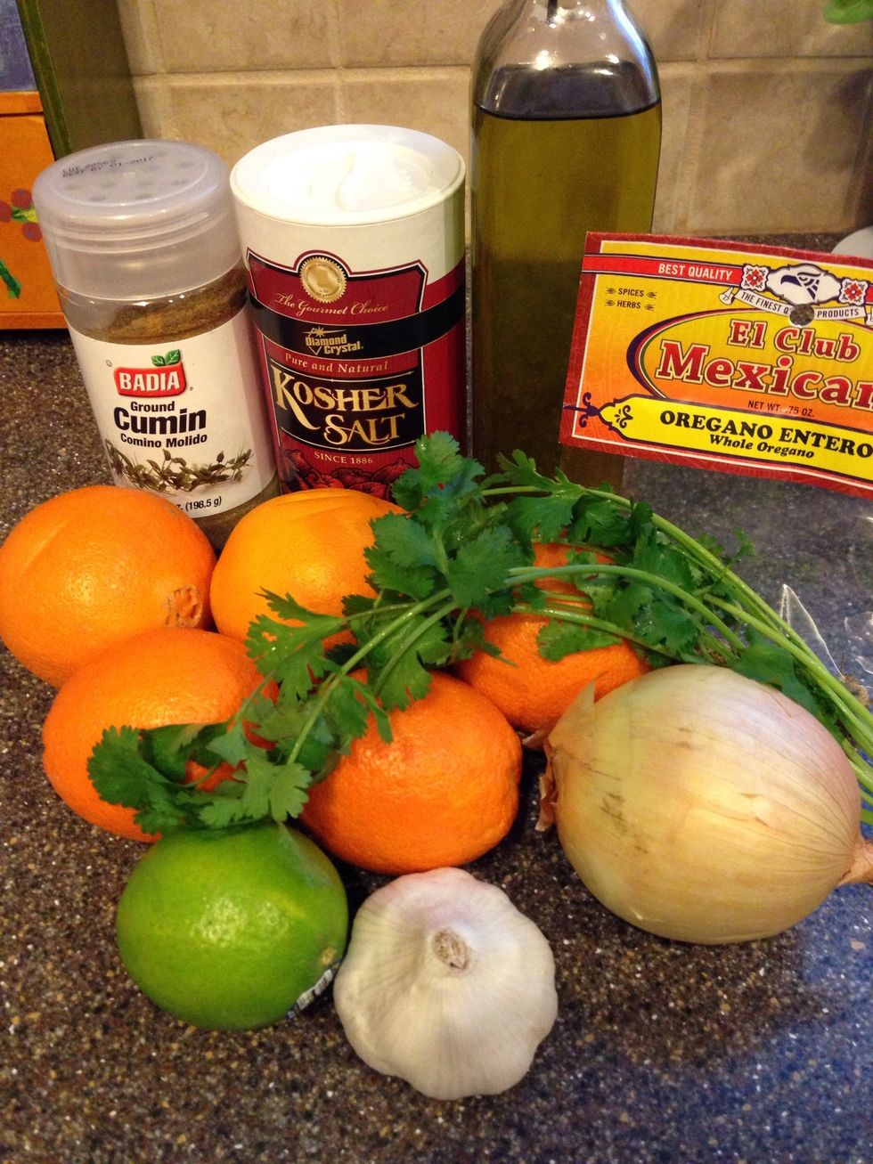 Put the 1 tsp salt, 1 tsp cumin, 2 tsp oregano &, 1/2 cup olive oil in a gallon ziplock. Add the other ingredients as we prep each of them.