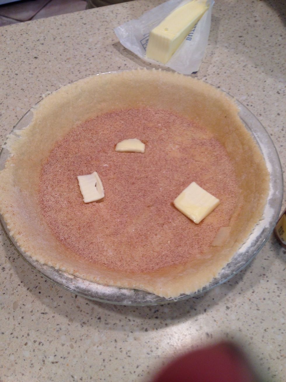 Put the 3 pats of butter on top