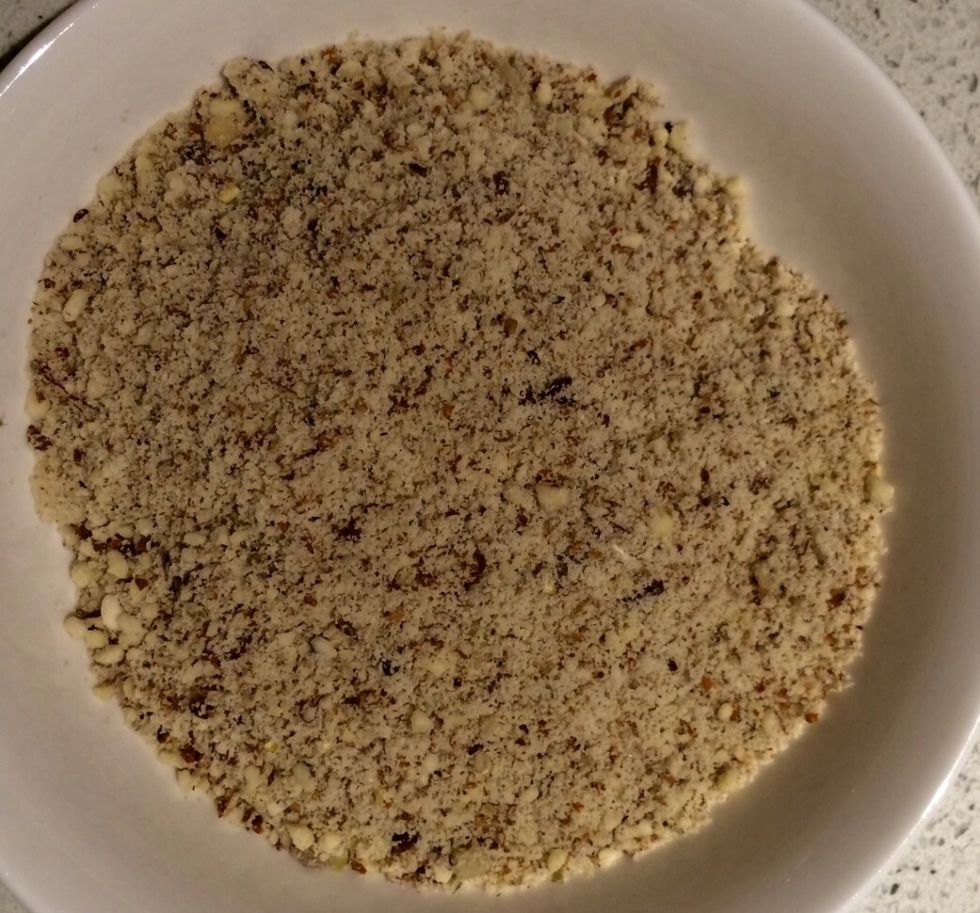 Put the almonds in the blender and blend them untill they are crumbs