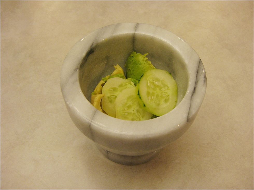 Put the avocado and cucumbers in a bowl of your choice. I used this pharmacy bowl, but you can use anything as long as you get it all mashed up.