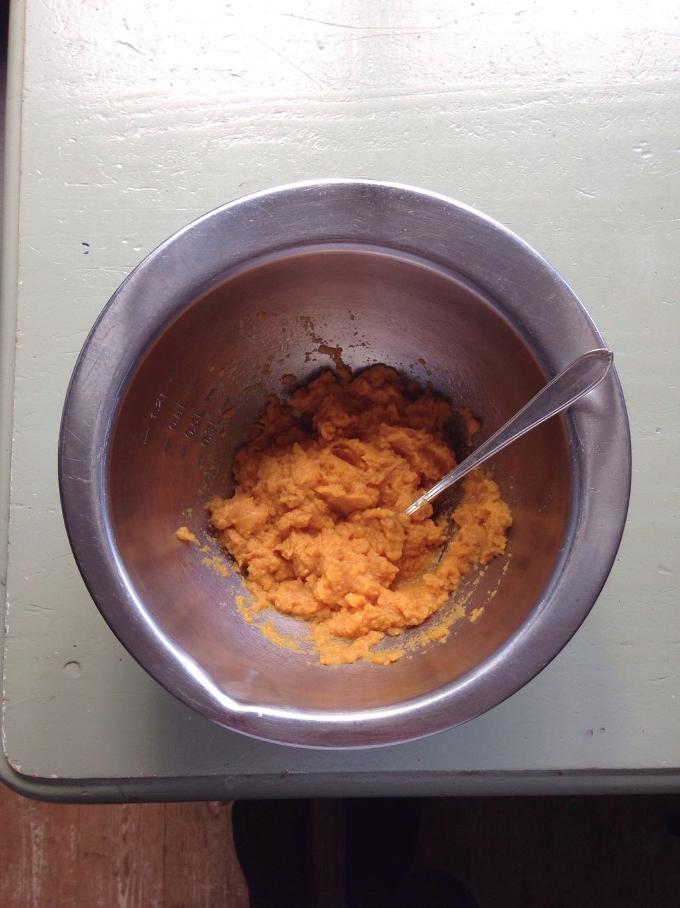 Put the baby food in a bowl. You can choose any flavour you like! Avoid any with artificial preservatives (should be easy, most are just pureed veggies and water), and onions. (Toxic for dogs!)