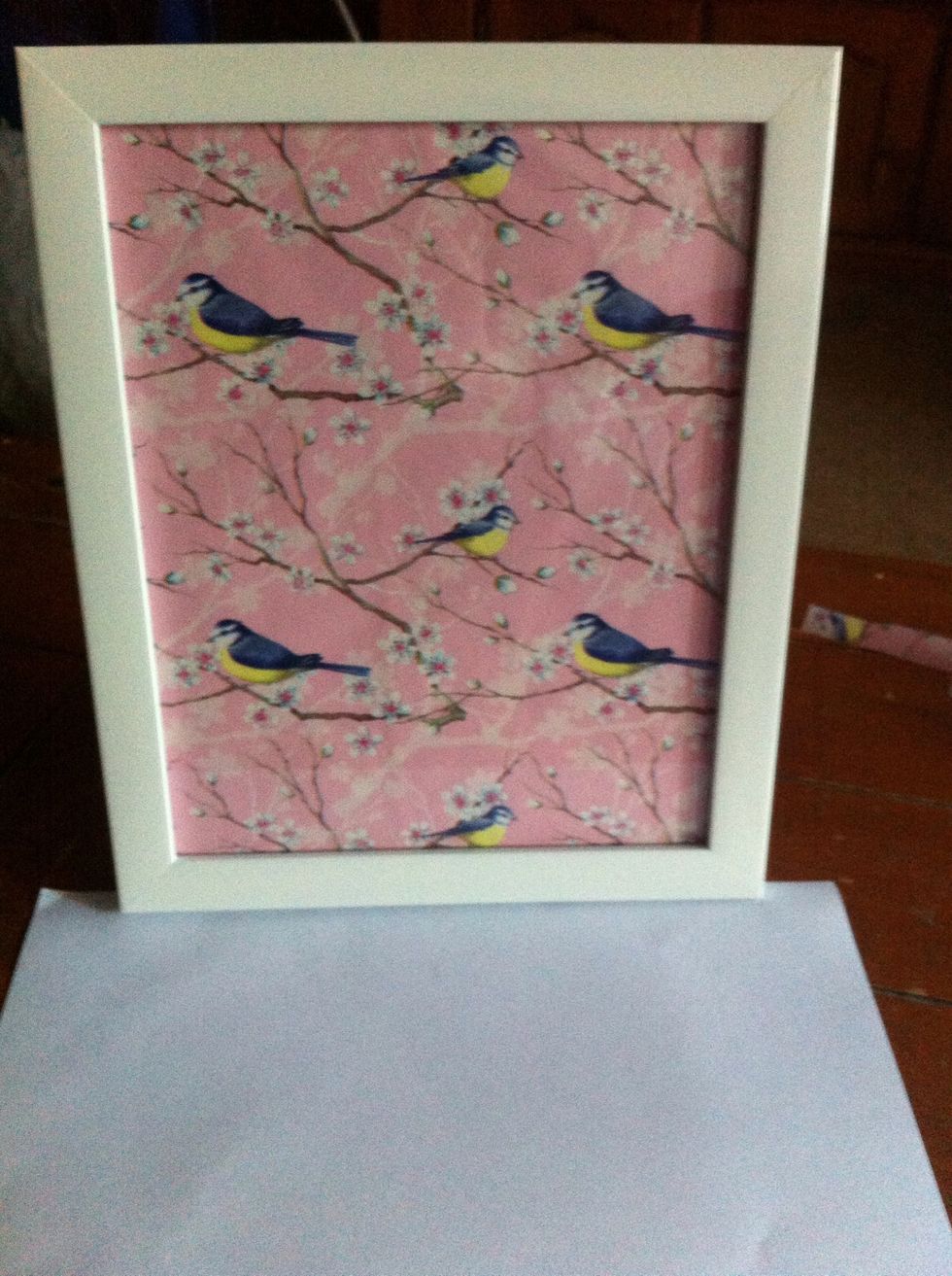 Put the backing of the frame on