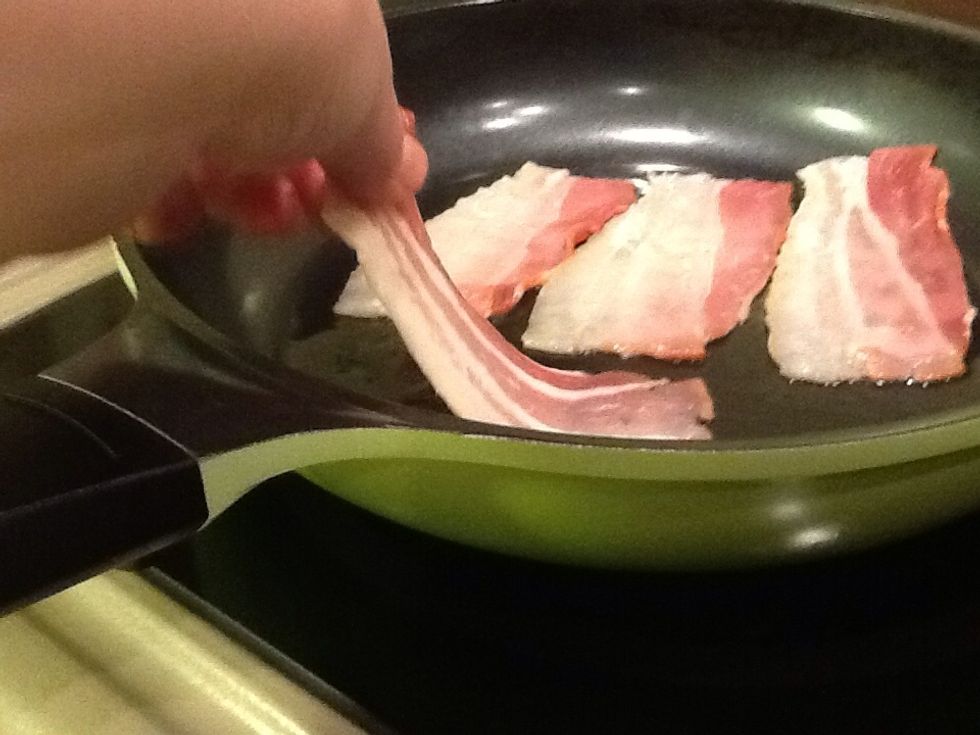 Put the bacon in the hot pan
