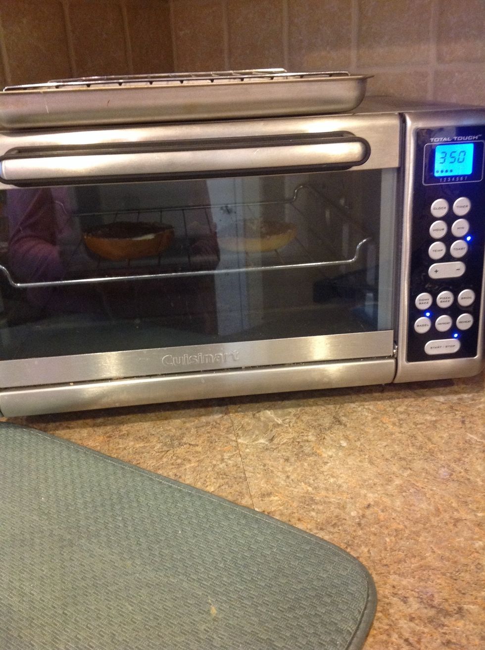 Put the bagel into the toaster for 3 - 4 minutes.