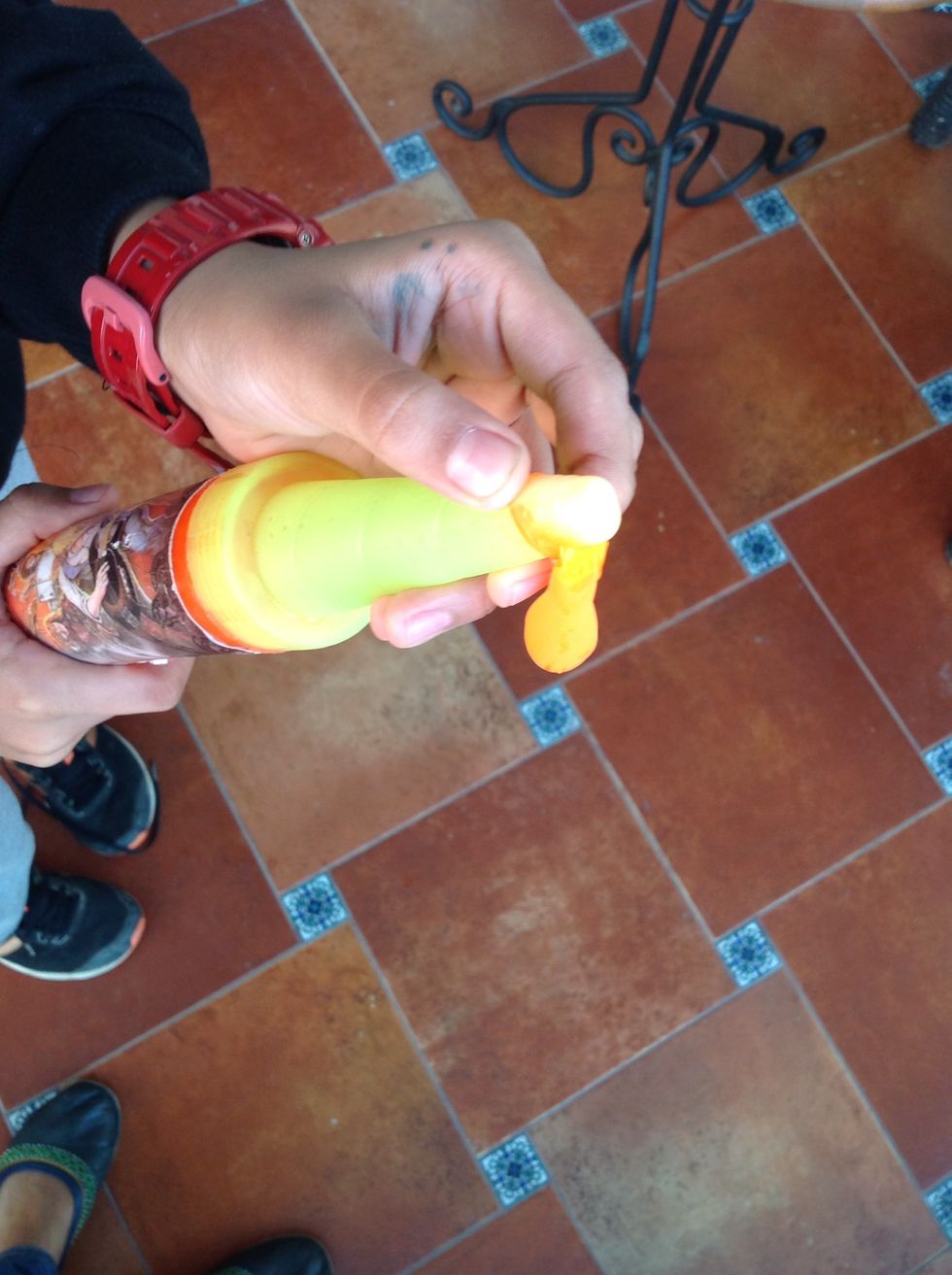 Put the balloon on the snout and exhale all the air.