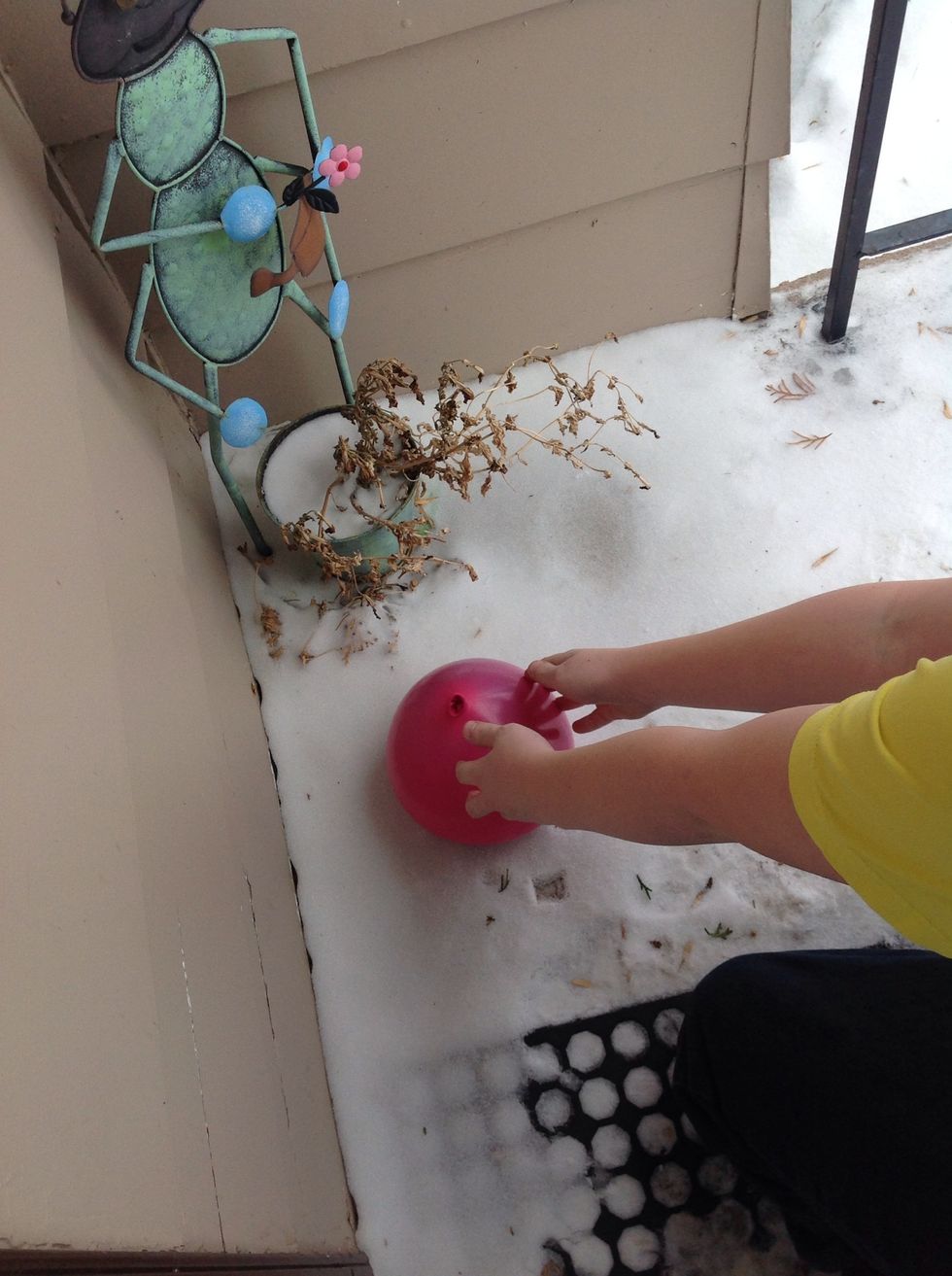 Put the balloon out side un tell it freezes