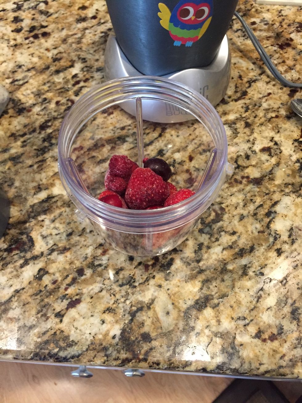 Put the berries or whatever fruit you have in your cup