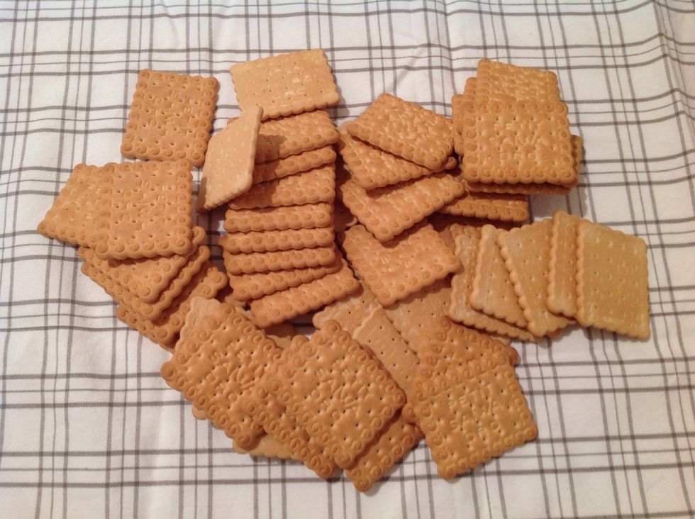 Put the biscuits on a clean dish towel, close it and beat with a meat mallet