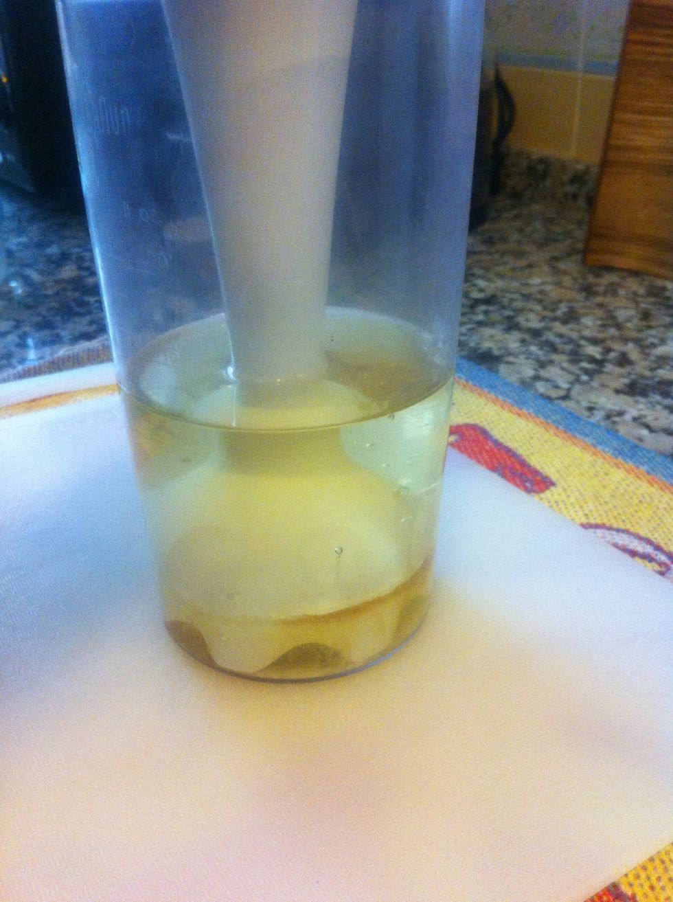 Put the blender at the bottom of the jug, covering the egg