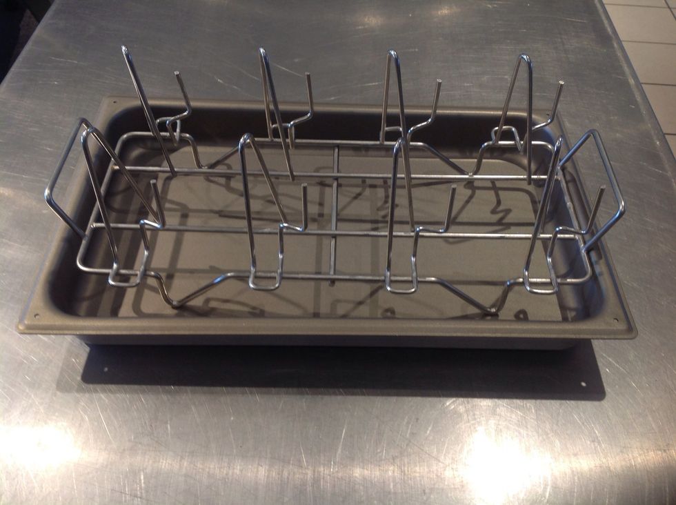 Put the Blodgett Rotisserie Roast Rack in the Blodgett Enamel Pan