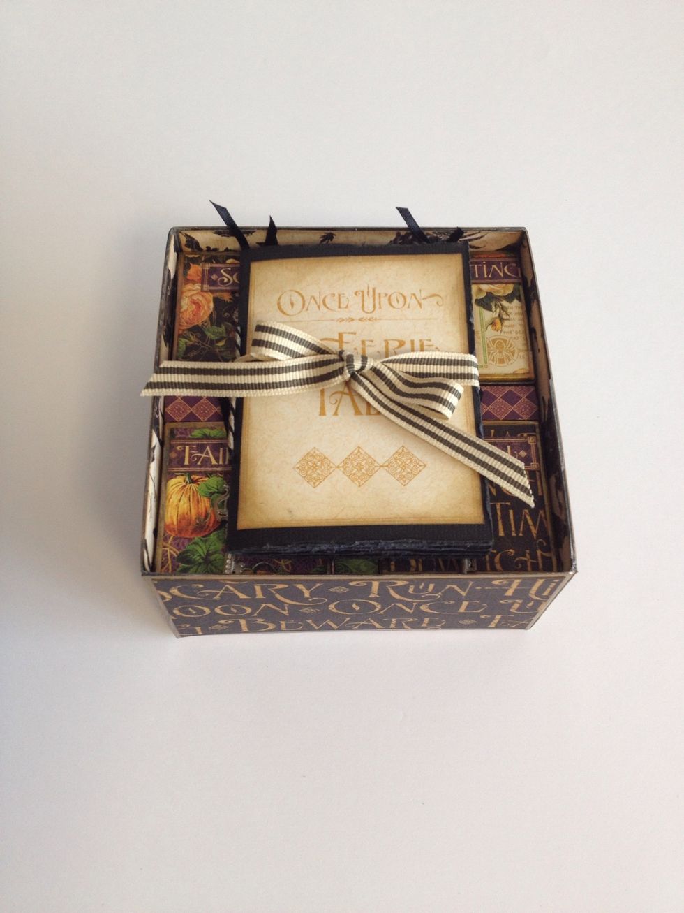 Put the book on the box in the box (Lol)