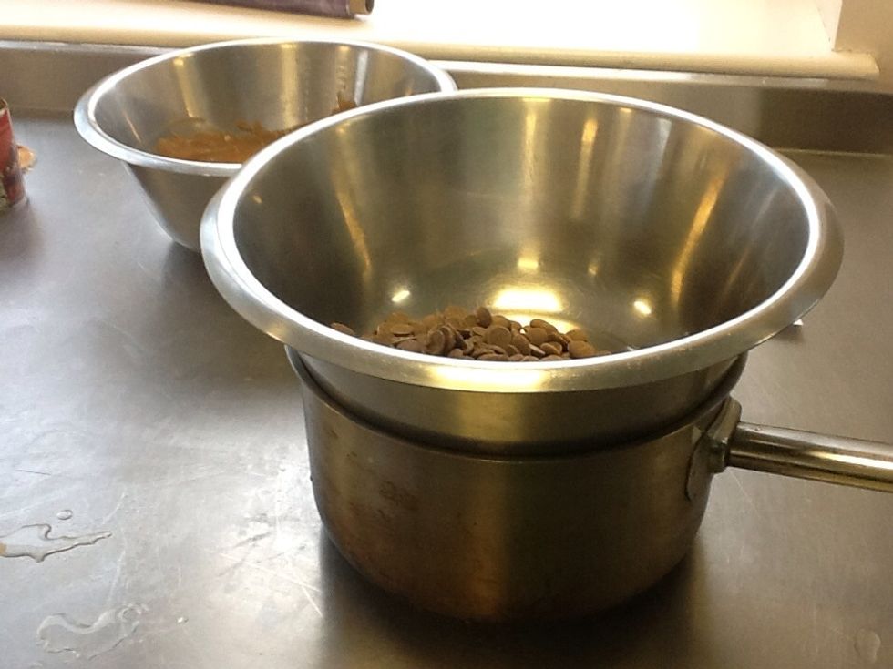 Put the bowl onto a saucepan full of water and heat the water to a boil