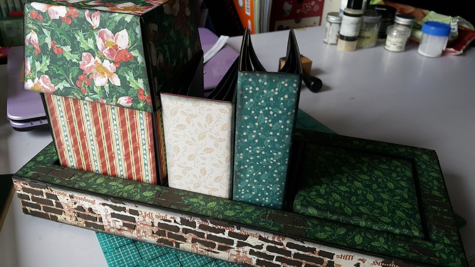 Put the box inside the last hole and this is what they look like before decorating