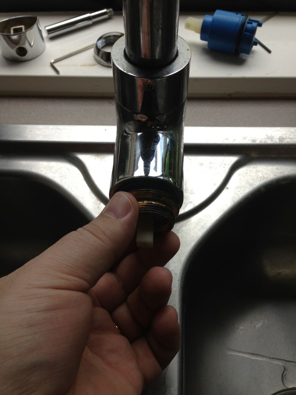 Put the brass nut over the top of the cartridge and tighten up, not too tight.
