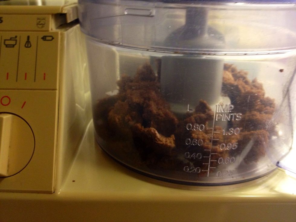 Put the bread in the food processor.