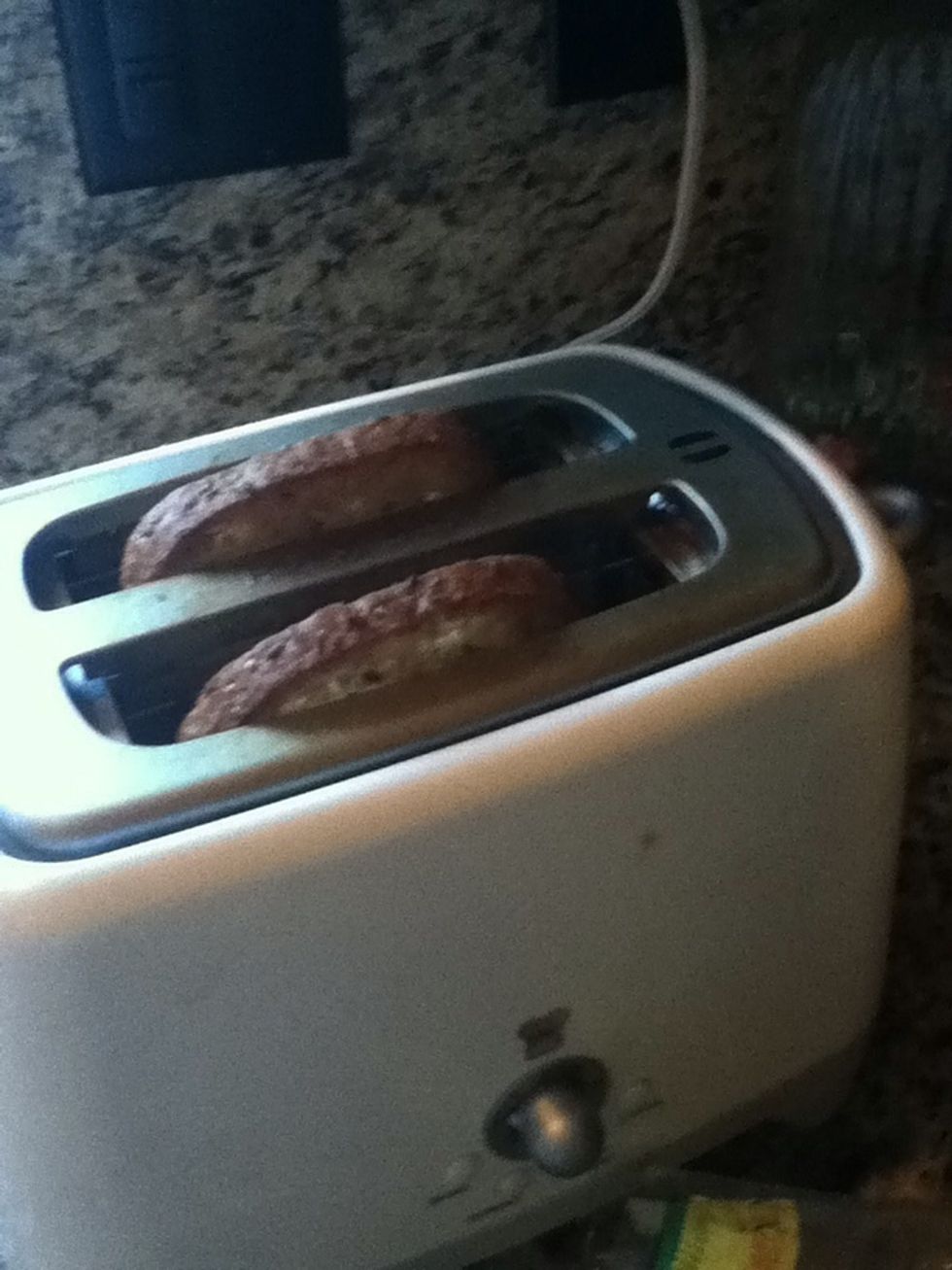 Put the bread in the toaster...obviously
