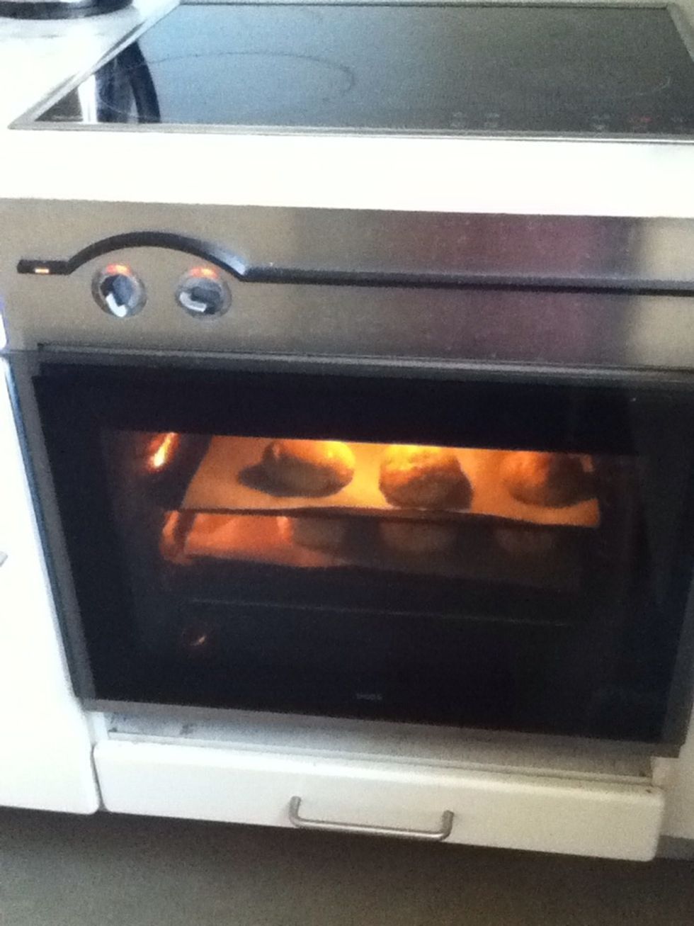Put the buns into the oven for about 15-20 min. But before you do that you need to bruch them with egg.