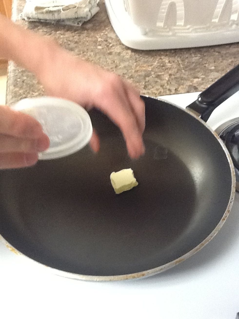 Put the butter in the heated sauce pan to melt it.