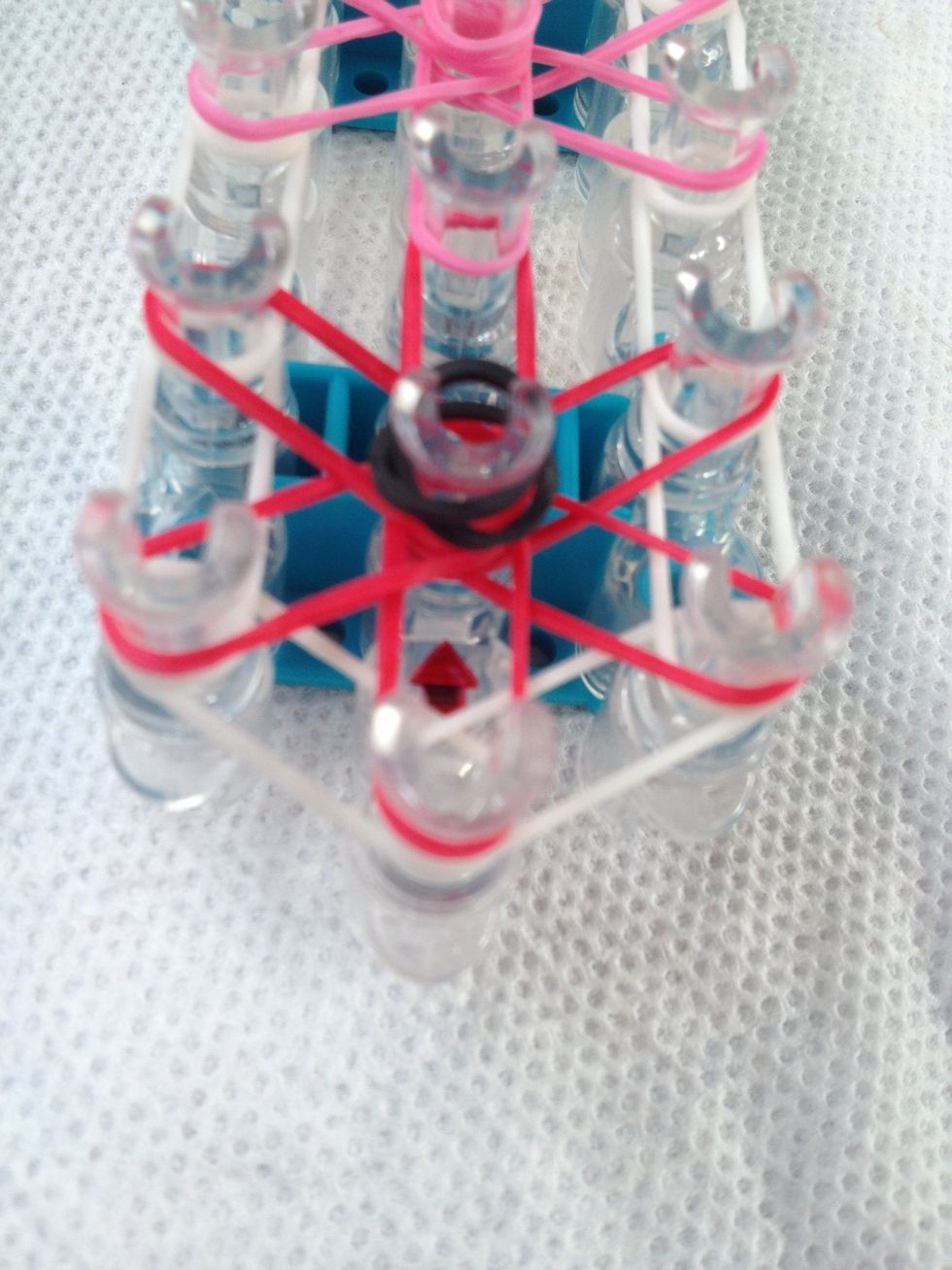 Put the cap band on the first starburst. Do the same process for the middle of all the starbursts until you get to the top.