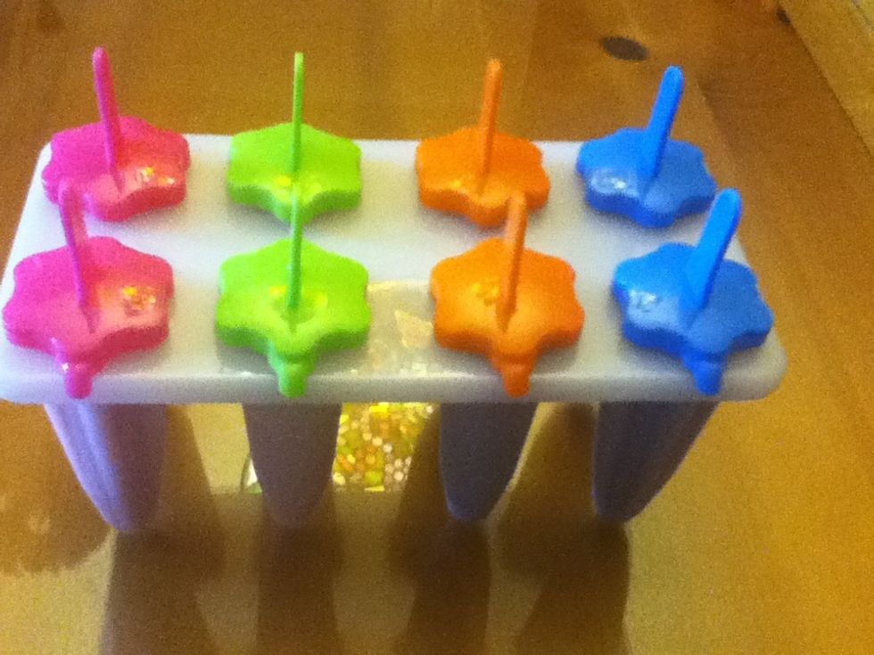 Put the caps on each mold.
