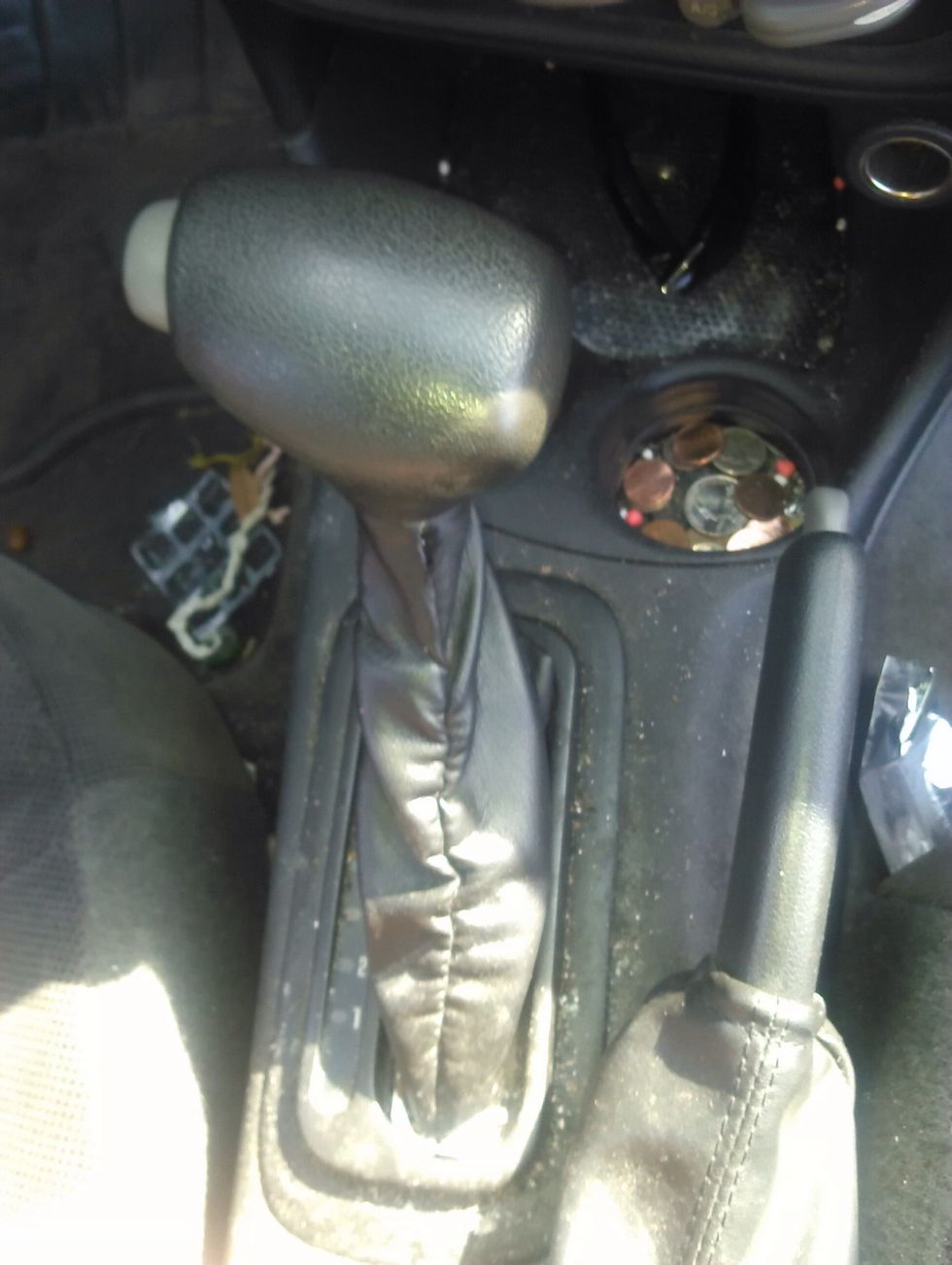 Put the car in reverse.