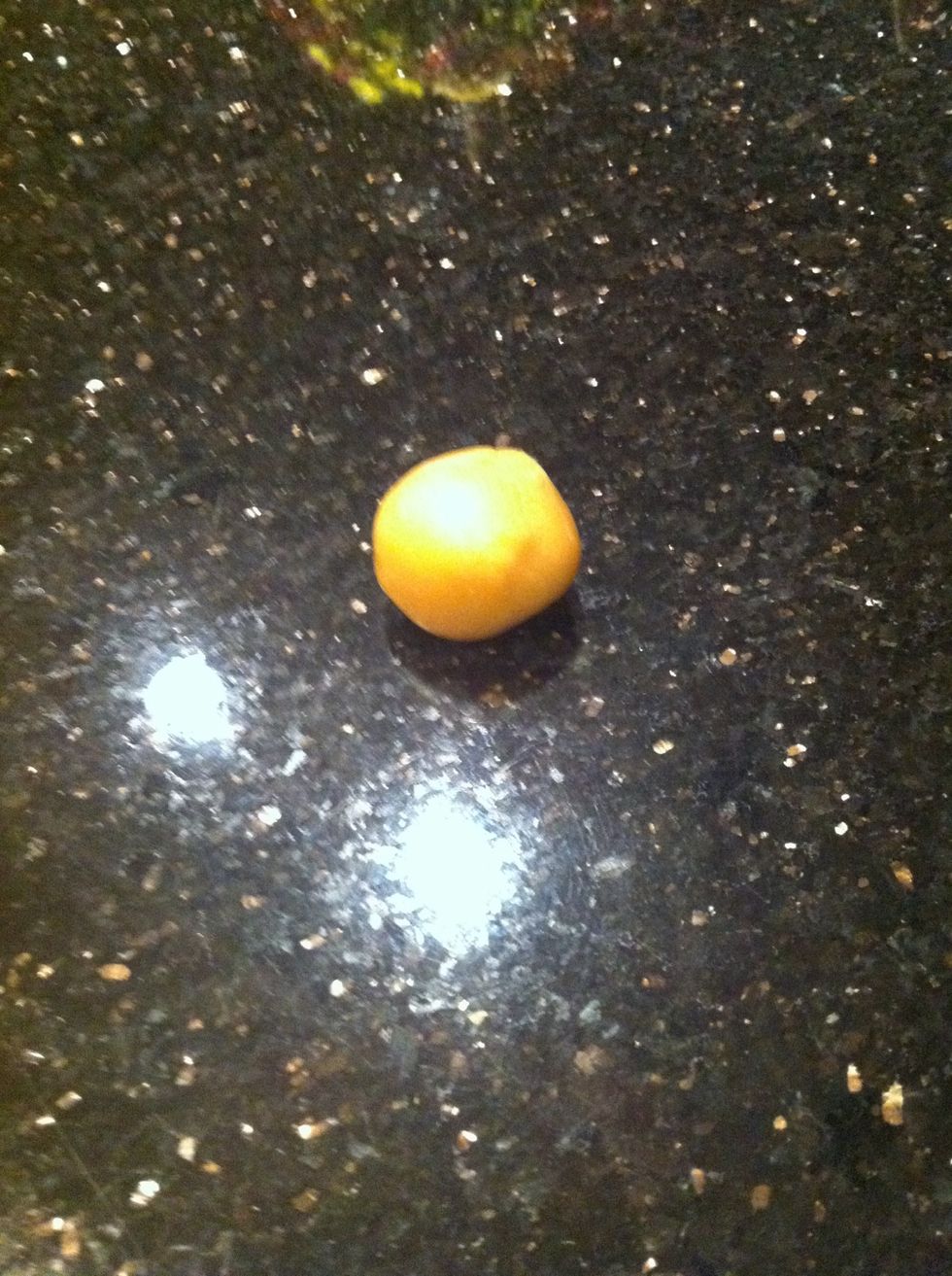 Put the caramels in pairs of two and form each two into a ball