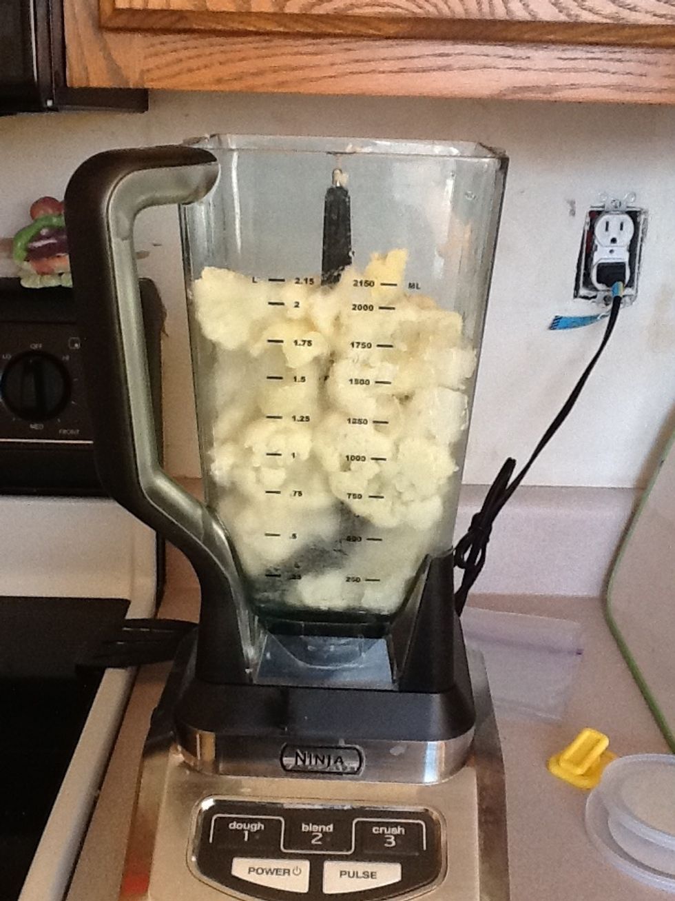 Put the cauliflower and 1 egg in the blender. I do this so there are no chunks of cauliflower in my pizza.