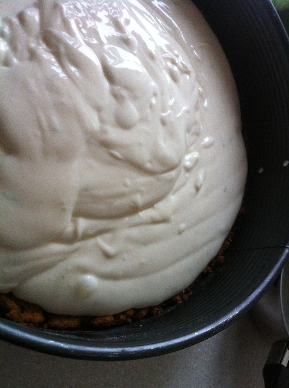 Put the cheese part on the cake base.