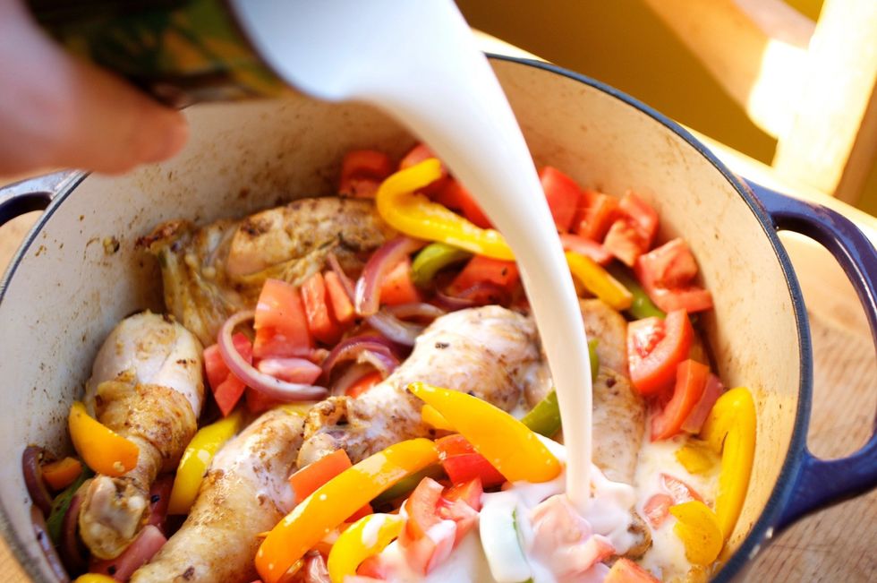 Put the chicken back in your pot then add 1 can of coconut milk as well as the last teaspoon of Curry in a Hurry and Ghee. Bring the pot to a boil - reduce to simmer. Cover and slowly cook for 1 hour.