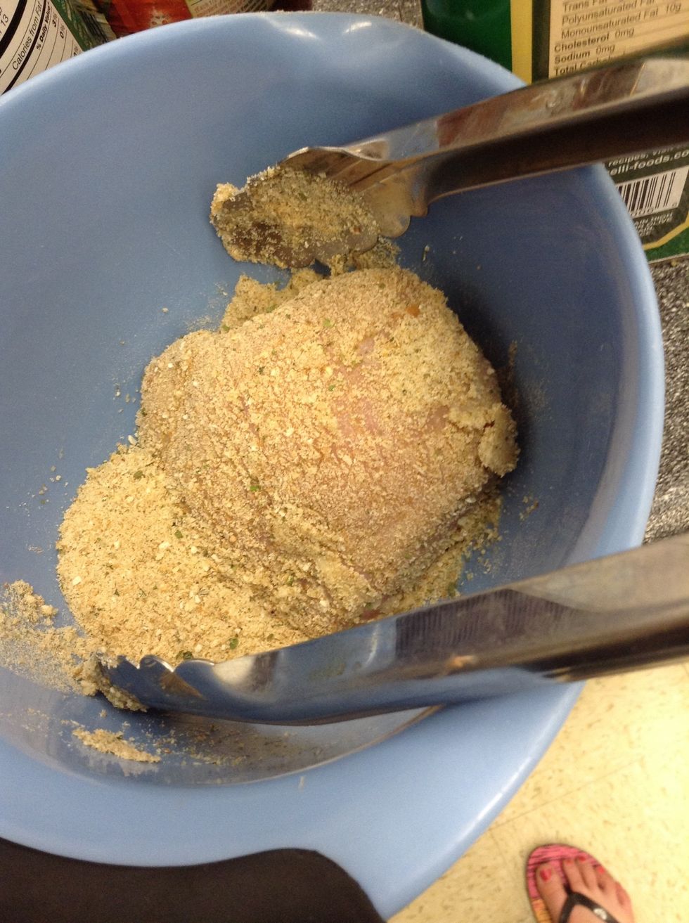 Put the chicken in bread crumbs.