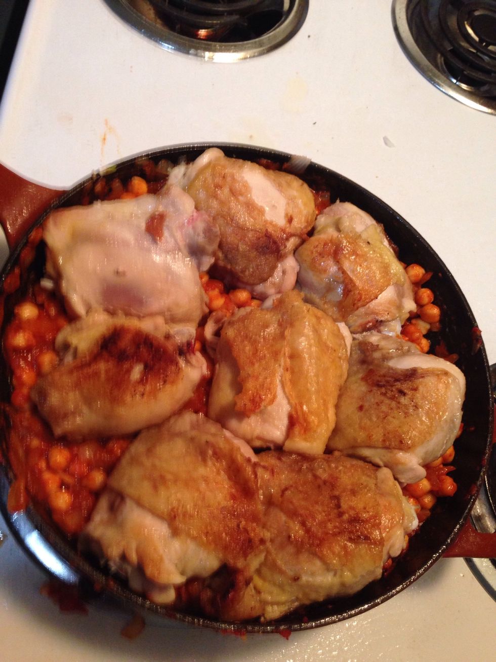 Put the chicken in the pan on top of the bean mix, skin up.   Put into the oven for 20-25 minutes.