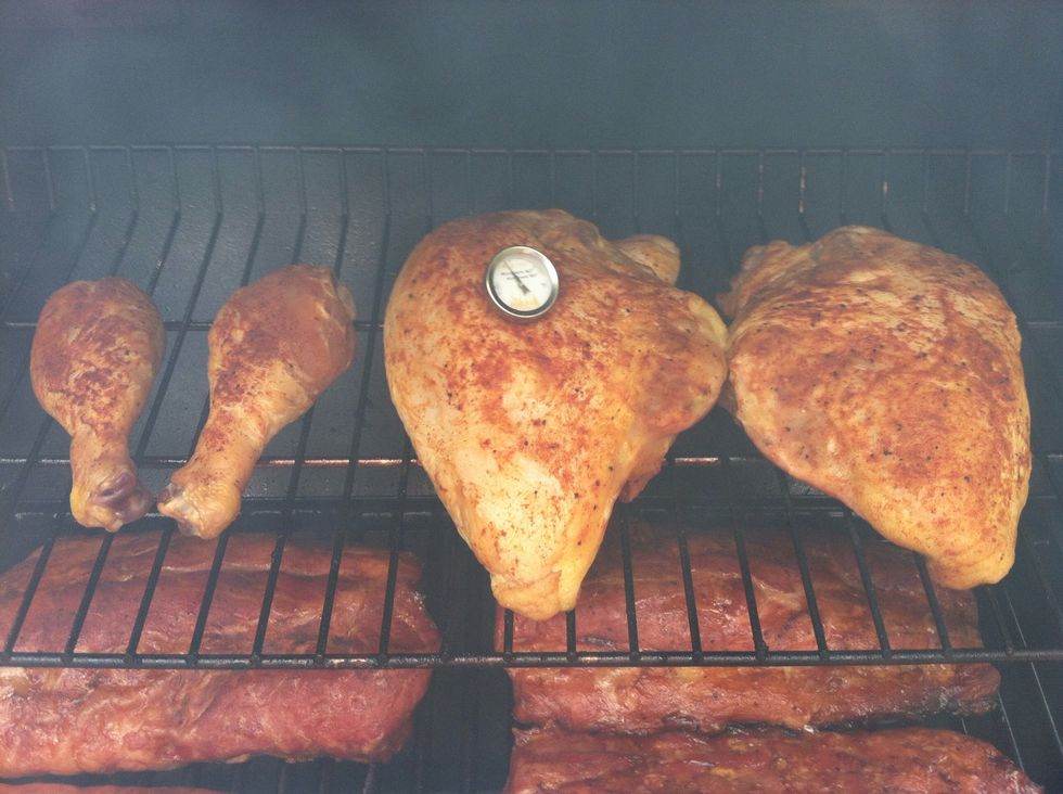 Put the chicken in the smoker. You will want to slow smoke the chicken until the internal chicken temperature reaches 167 degrees.