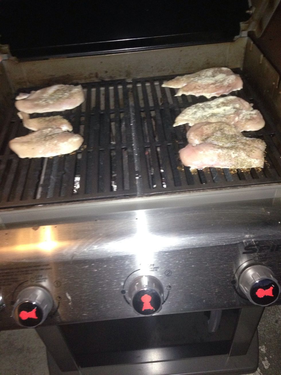 Put the chicken on the grill. Cook for 4 mins on each side on high heat.