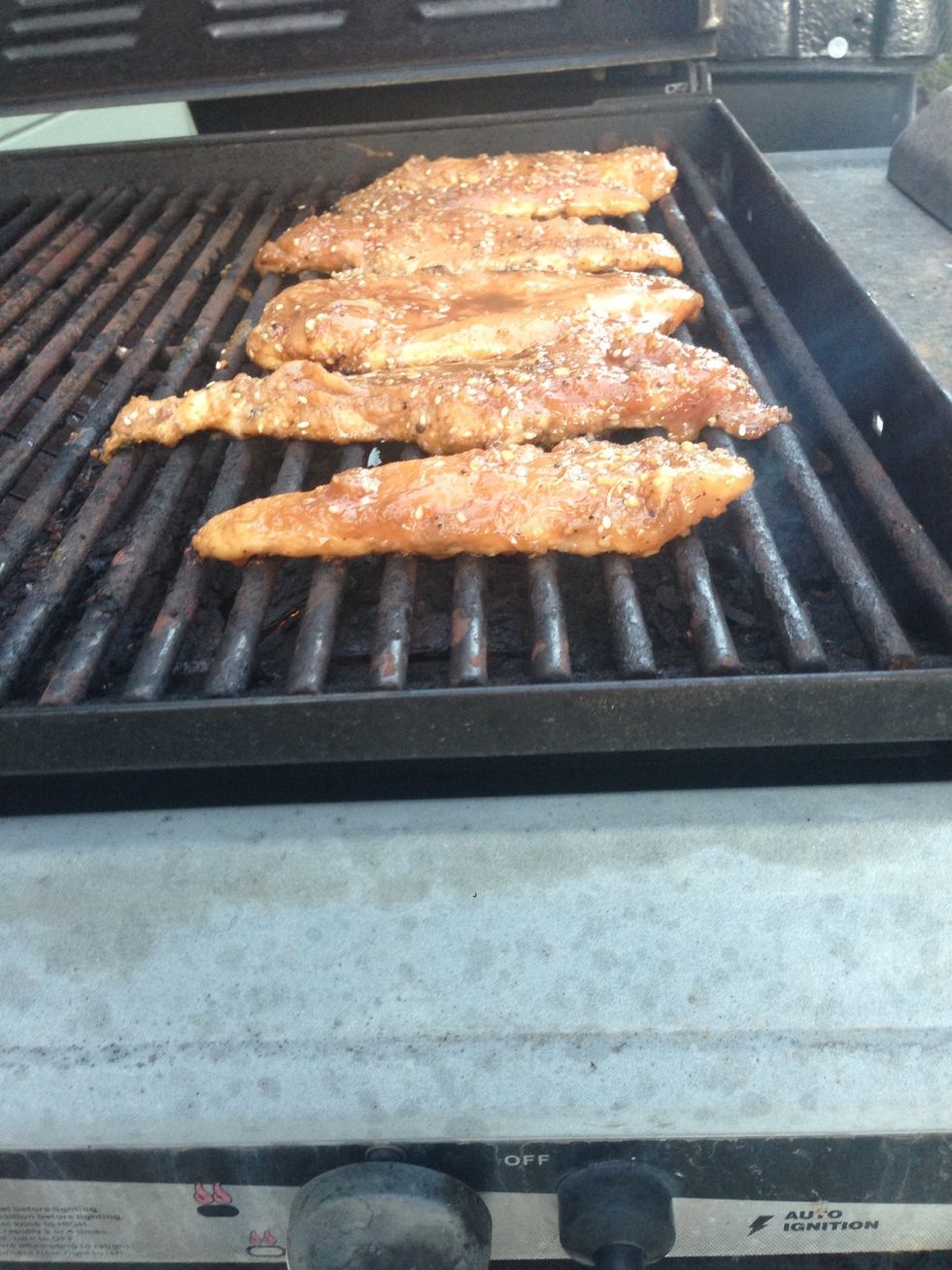 Put the chicken on the grill for 4 mins or until golden brown on one side. Then flip over.