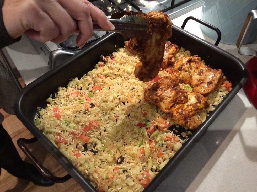 Put the chicken on the rice