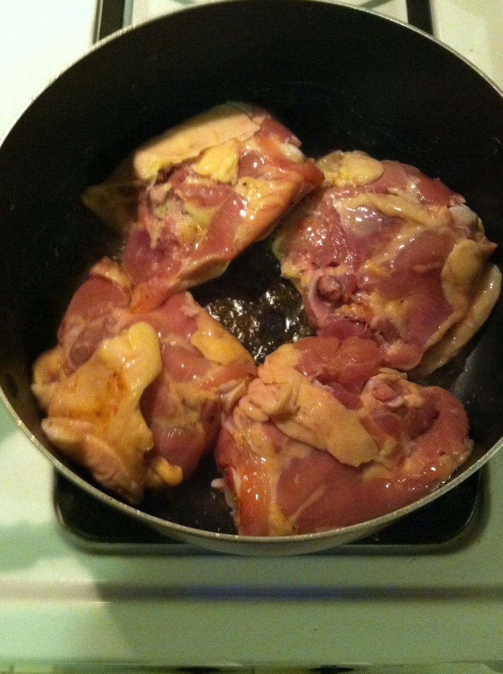 Put the chicken thighs in the pan seasoning side down cook until golden brown and crispy. when faced down season the other side.