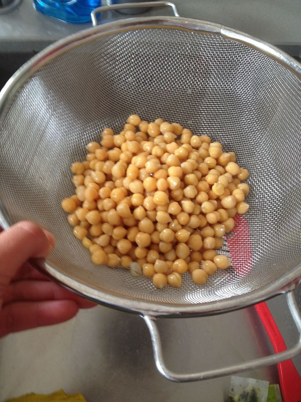 Put the chickpeas in a colander.