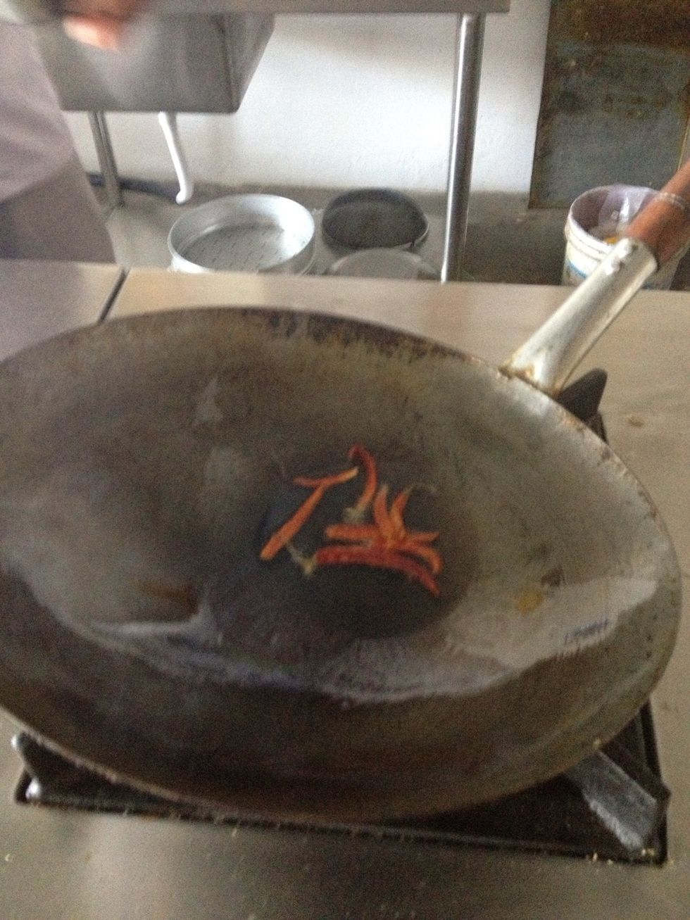Put the chile on and before it get dark add jeera( cumin).