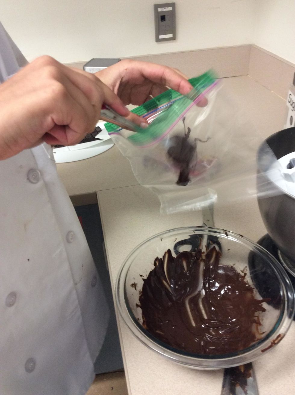 Put the chocolate into a plastic baggie after you've let it cool slightly