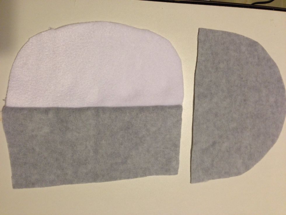 Put the clamp piece to the side and grab ur bottom head pieces like so. We're going to sew the back bottom to the front bottom.