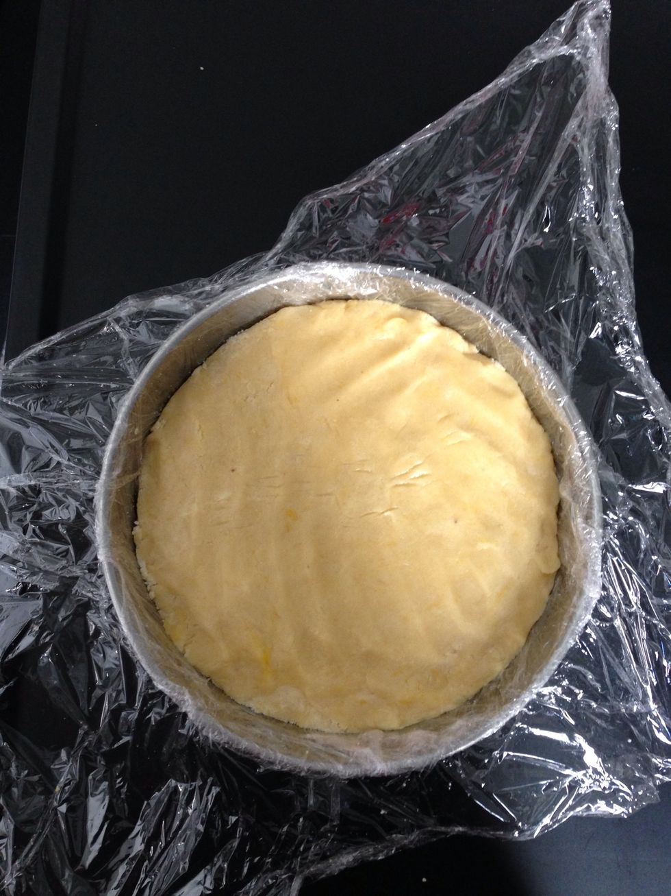 Put the cling film in a small cake mould and press delicately the mixture to make a round dough. When you want to roll it you would start with a nice circle. ..just an idea lol