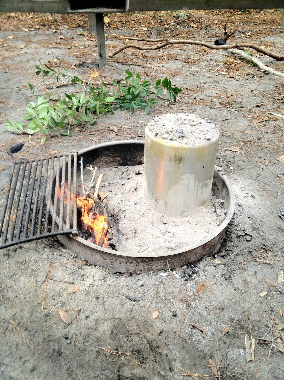 Put the coals all around and on top of the pot (I kept feeding the coals with a second fire only bc my initial fire was pretty small)