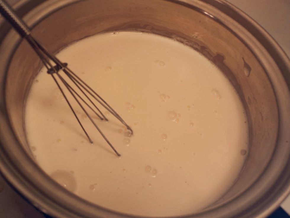 Put the coconut milk, or cooking cream (I prefer cream) in a small saucepan and heat up. It doesn't need to be boiling, but still very hot!