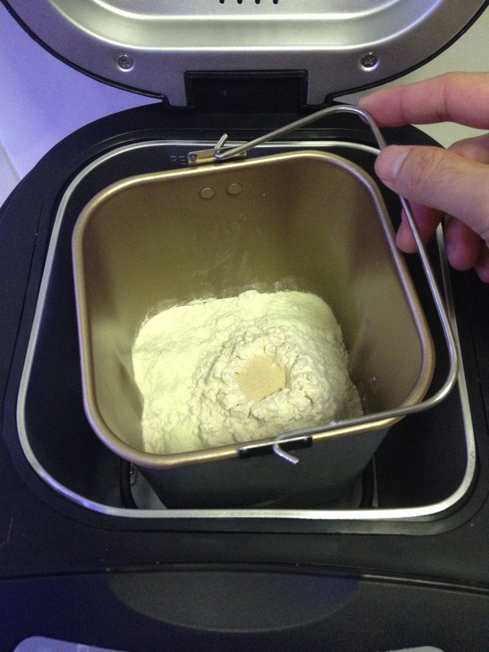 Put the container back into the bread maker.