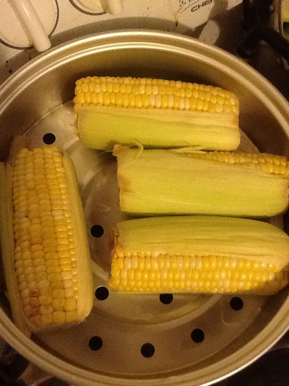 Put the corn into the steamer......