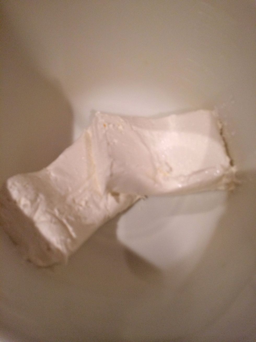 Put the cream cheese in a mixing bowl