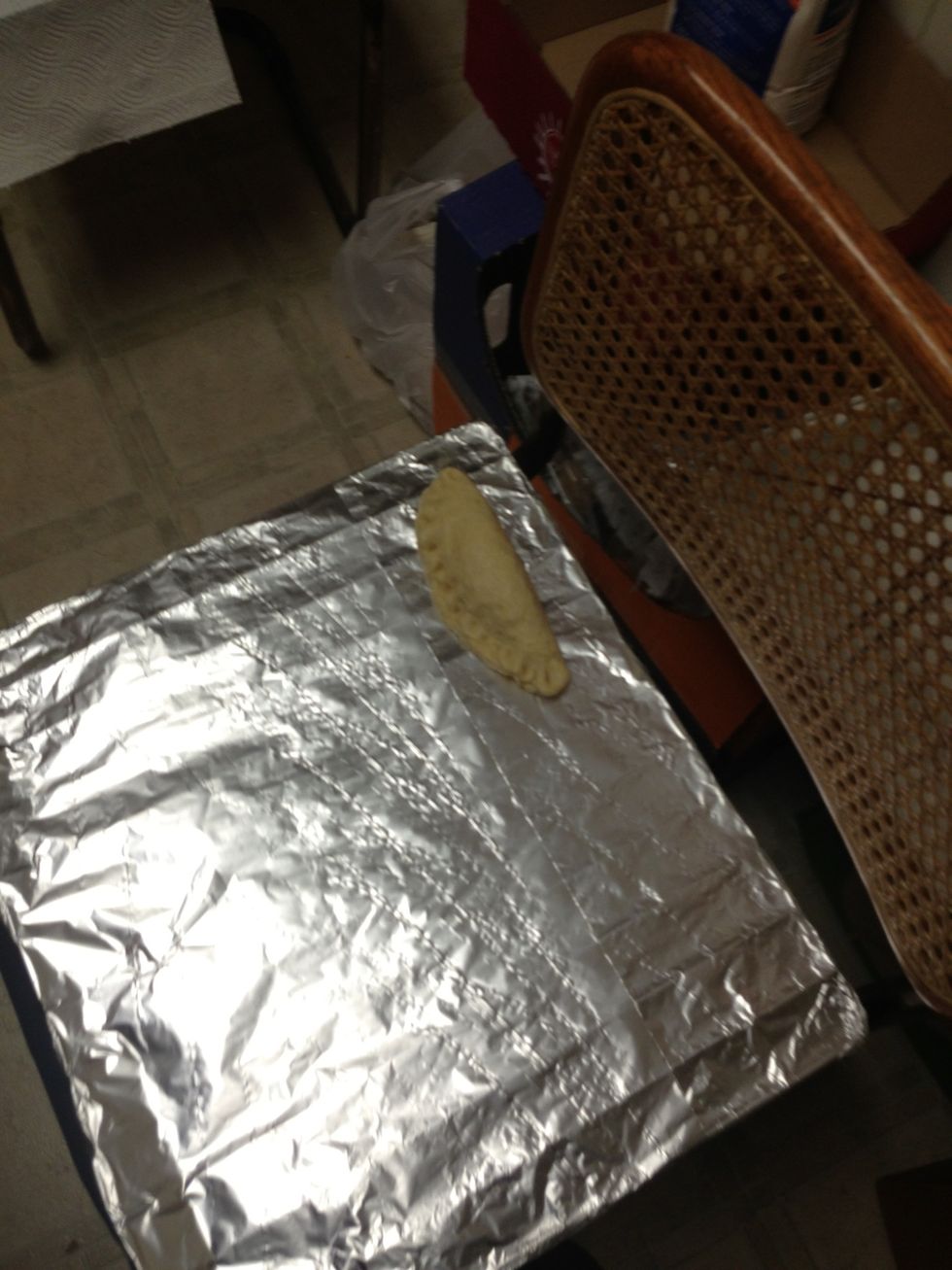 Put the created pie on the oven metal covered with foil