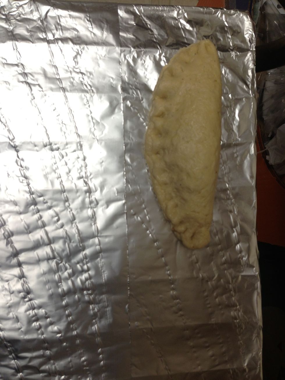 Put the created pie on the oven metal covered with foil