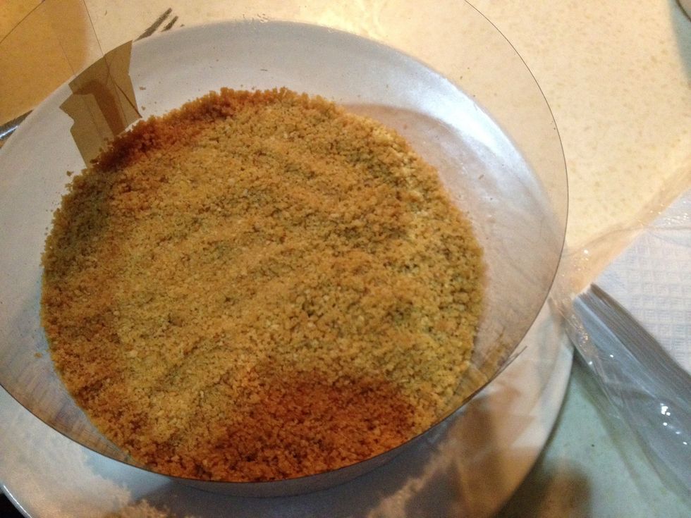 Put the crumb and butter mixture inside the ring